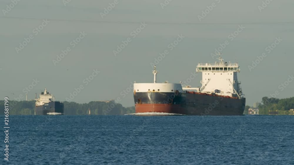 Two Freight Ships Barreling Down The Open Water Two Freight Ships Barreling Down The Open Water