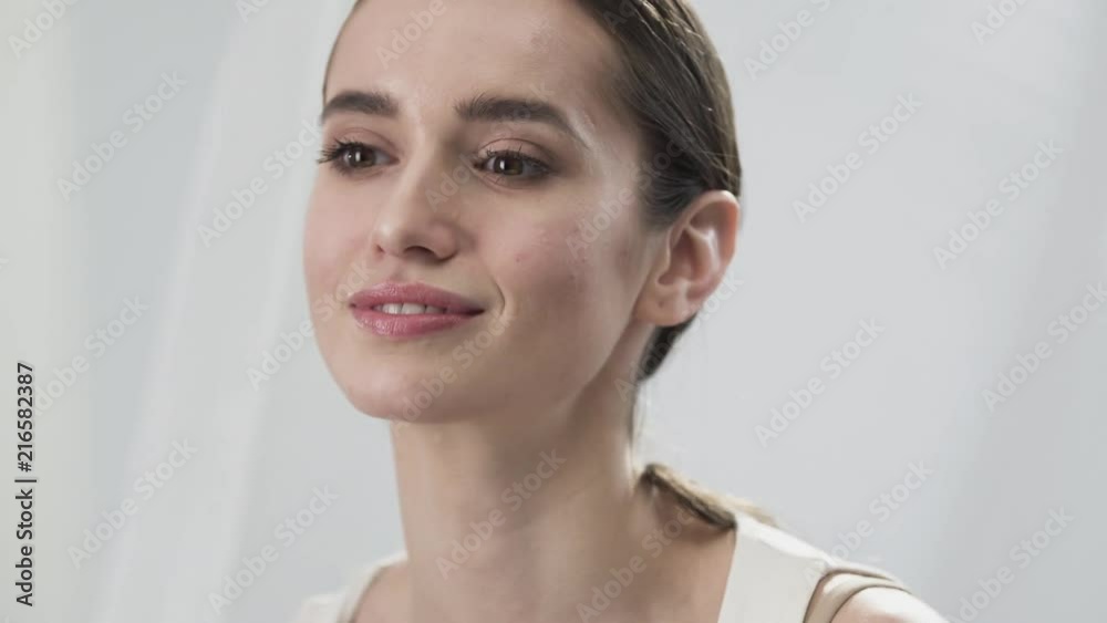 Face Skin Care. Beautiful Woman Touching Face Skin And Smiling Face Skin Care. Beautiful Woman Touching Face Skin And Smiling