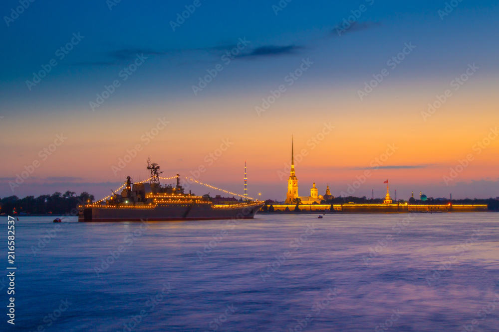 Saint Petersburg. Peter-Pavel's Fortress. White nights in Petersburg. Cities of Russia. Neva River. St. Peter and Paul Fortress with night illumination. Panorama of Petersburg.