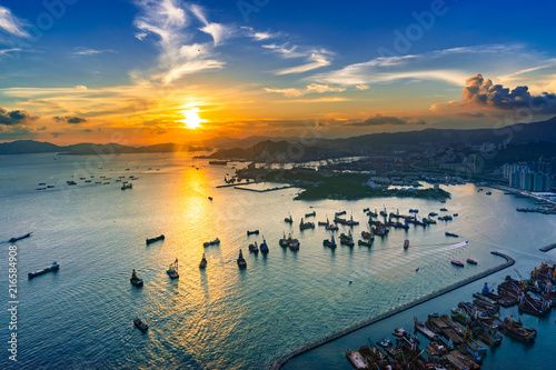 Aerial view sunset at Victoria Harbor of Hong Kong