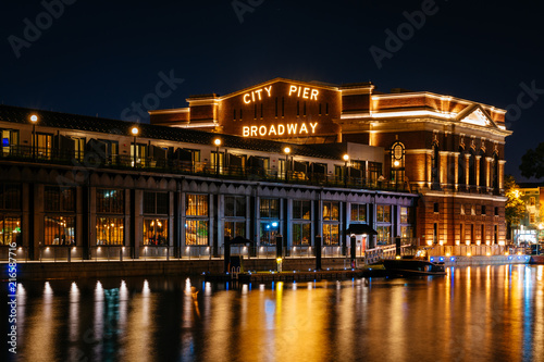 The historic Broadway Pier at night, in Fells Point, Baltimore, Maryland. photo