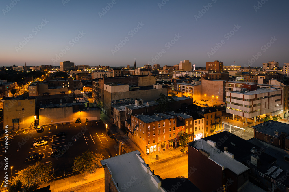 View of the west side of downtown at night, in Baltimore, Maryland