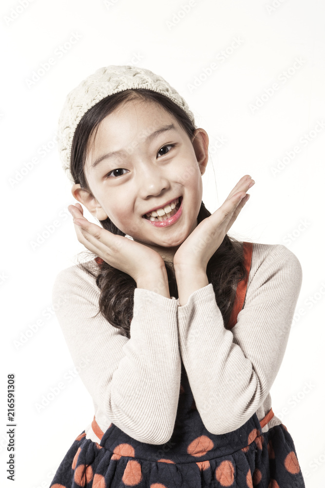 A asian girl portrait wearing winter clothes isolated white. A asian girl portrait wearing winter clothes isolated white.