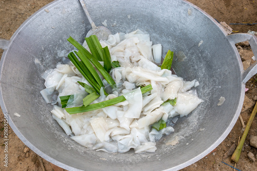 Coconut sweet young or Maprao Keaw in a pan at Chiang Khan photo