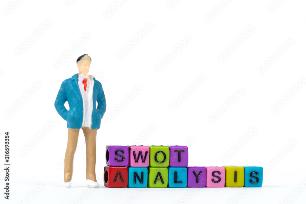 Businessman or manager with SWOT ANALYSIS text made from colorful beads or letter bead on white background, finance and business concept. Businessman or manager with SWOT ANALYSIS text made from colorful beads or letter bead on white background, finance and business concept.