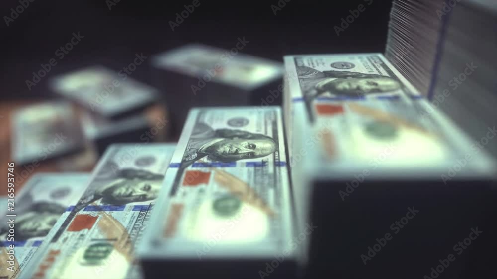 Dollar bills stacked in shape of growing bar chart. Concept of success in business. Dollar bills stacked in shape of growing bar chart. Concept of success in business.