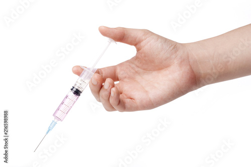 hand hold a syringe isolated white.