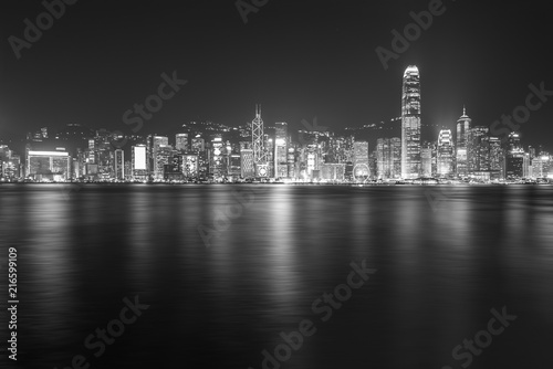 Panorama of Victoria Harbor of Hong Kong city at night © leeyiutung