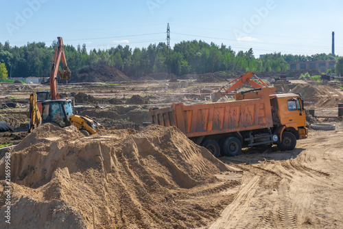 The truck brought sand to the construction site