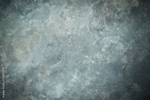Gray lighted wall texture for designer background. Painted surface.