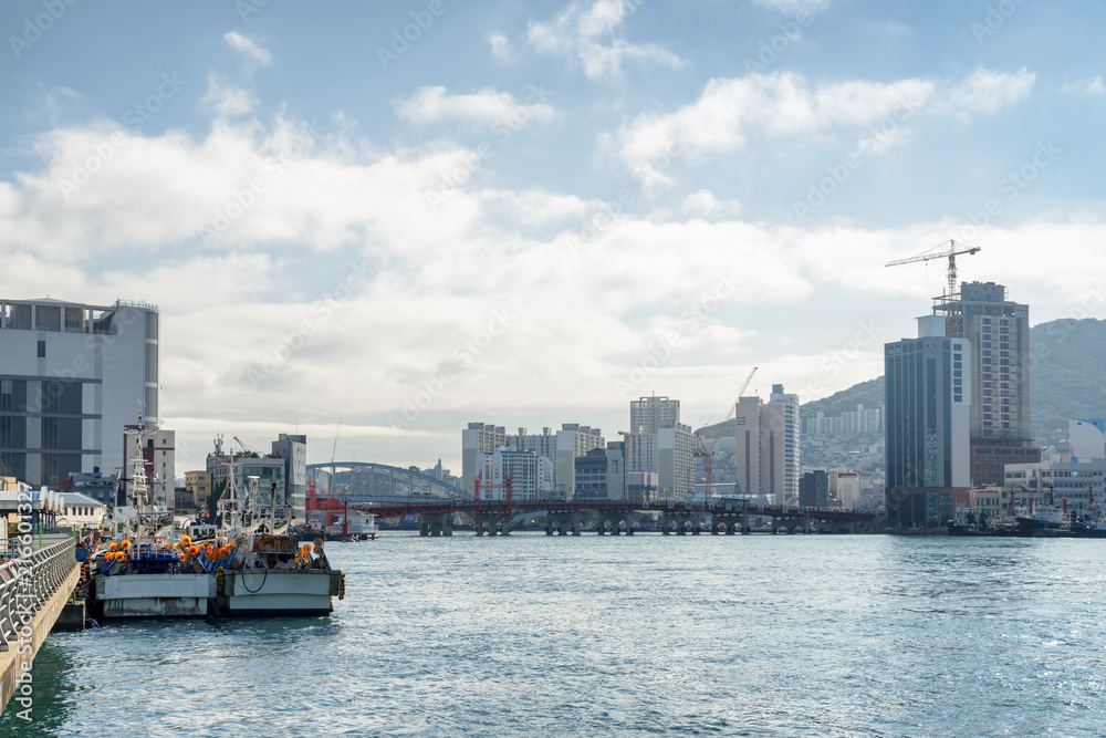 Fototapeta premium Amazing view of Busan in South Korea. Parked fishing vessels