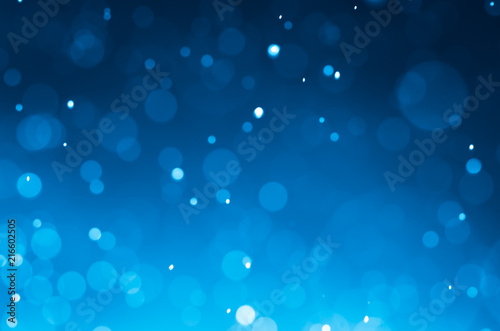 Dark blue abstract backgrounds with bokeh.