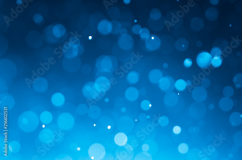 Dark blue abstract backgrounds with bokeh.