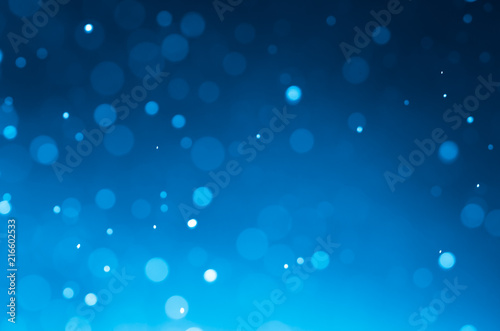 Dark blue abstract backgrounds with bokeh.