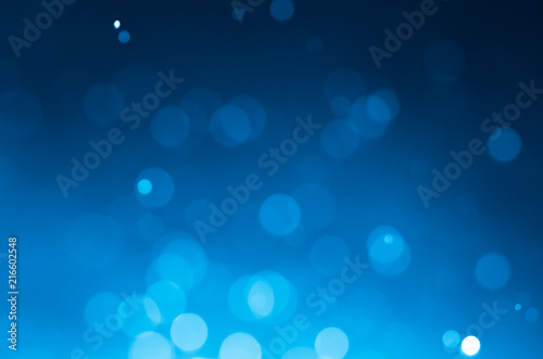 Dark blue abstract backgrounds with bokeh.