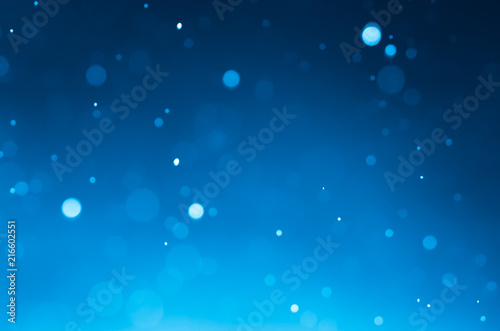 Dark blue abstract backgrounds with bokeh.