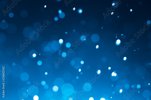 Dark blue abstract backgrounds with bokeh.