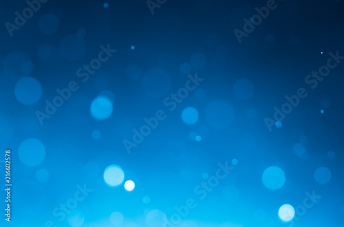 Dark blue abstract backgrounds with bokeh.