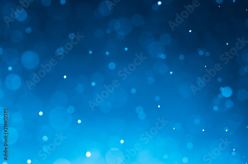 Dark blue abstract backgrounds with bokeh.