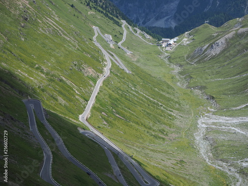 Road to the Stelvio mountain pass in Italy. Amazing view at the mountain bends creating beautiful shapes photo