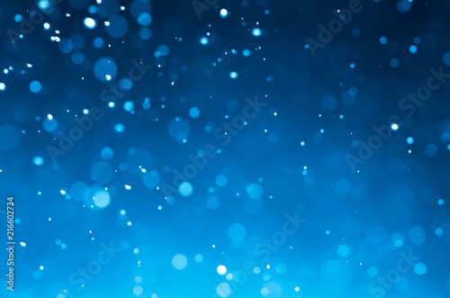 Dark blue abstract backgrounds with bokeh.