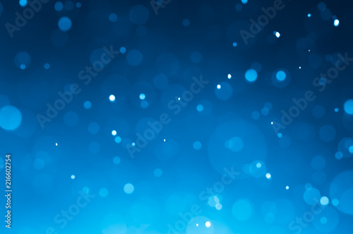Dark blue abstract backgrounds with bokeh.