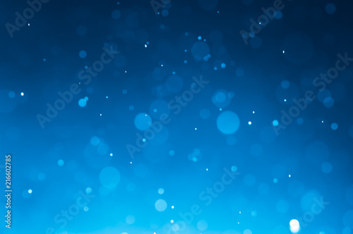 Dark blue abstract backgrounds with bokeh.