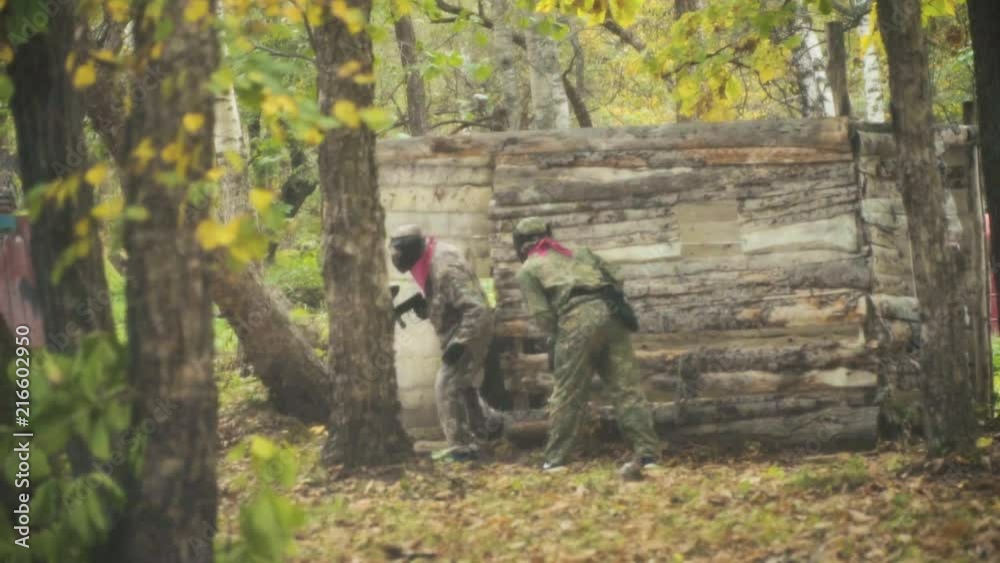 playing paintball in the Woods playing paintball in the Woods