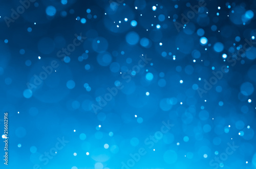 Dark blue abstract backgrounds with bokeh.
