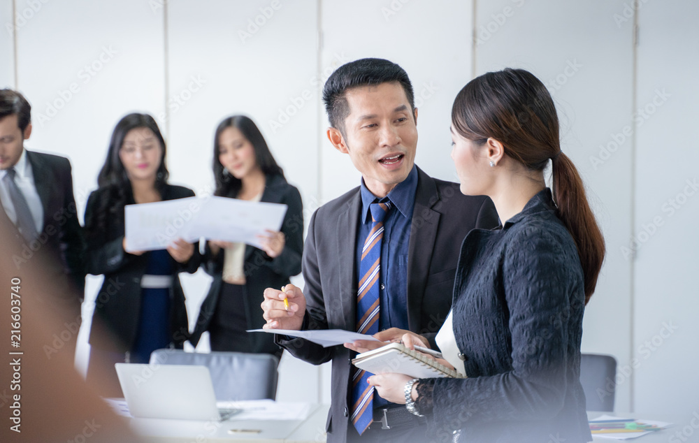 group of successful businessman. Discussion of the business profits of the company in meeting room or conference room. group of successful businessman. Discussion of the business profits of the company in meeting room or conference room.