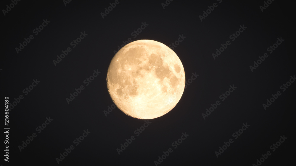 Fototapeta premium Full moon on the dark night sky.