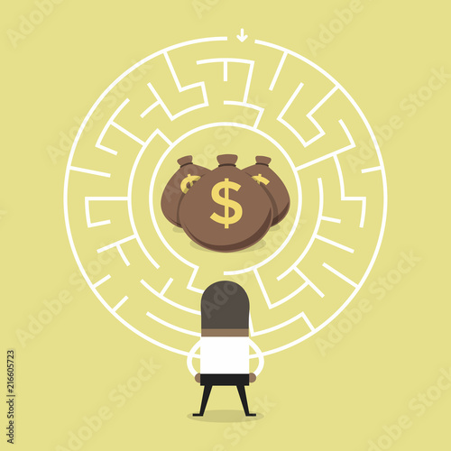 African businessman wanting to enter a money maze.