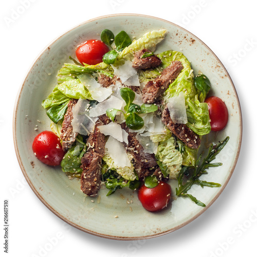 Fresh salad, isolated on white background, view from above photo