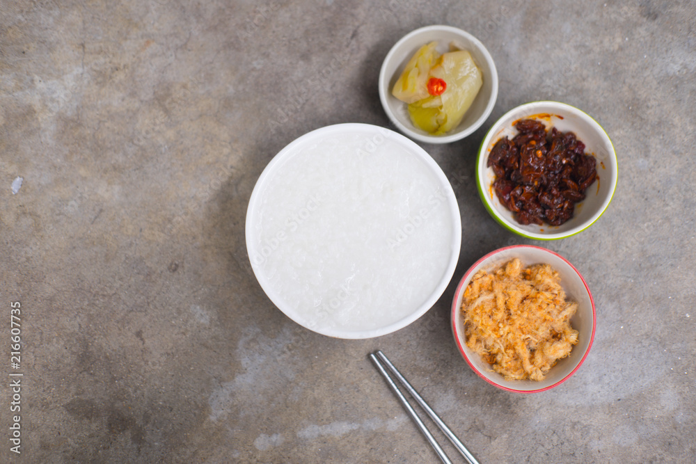 Delicious rice gruel in white bowl. Thai food for healthy Delicious rice gruel in white bowl. Thai food for healthy