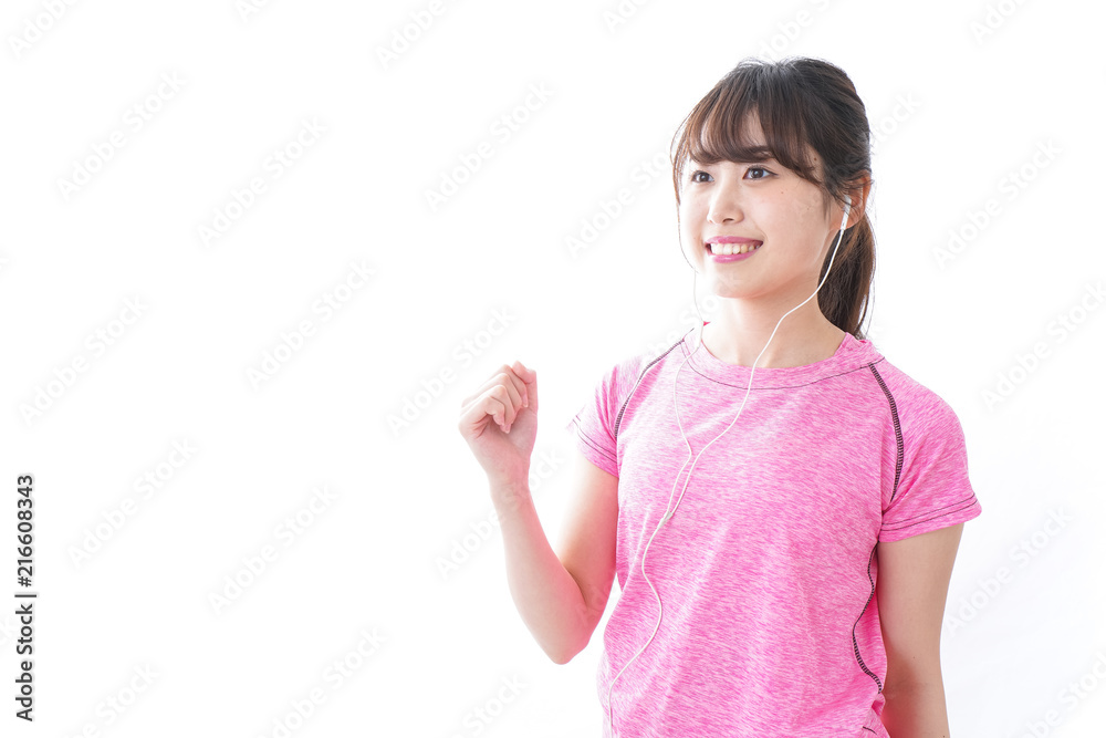 ランニングをする若い女性 ランニングをする若い女性