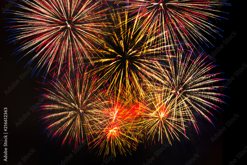 Awesome isolated Festive fireworks on a dark background. Can be used as wallpaper or background Awesome isolated Festive fireworks on a dark background. Can be used as wallpaper or background