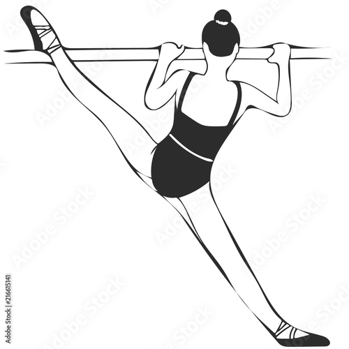 Ballerina in straddle split at barre