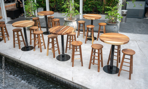 Dining wooden tables with wooden chairs for dining out