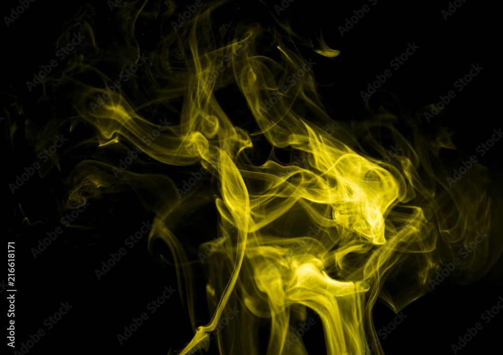 Yellow smoke on black background Yellow smoke on black background