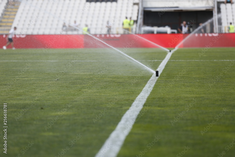 Fototapeta premium watering the football field