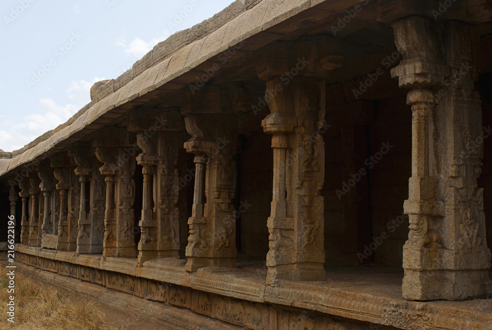 Carved pillars of the inner courtyard, cloisters or pillared verandah, Achyuta Raya temple, Hampi, Karnataka. Sacred Center.
