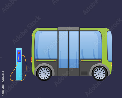 Beautiful multi-seat electric bus, autobus near city's charging electric station.