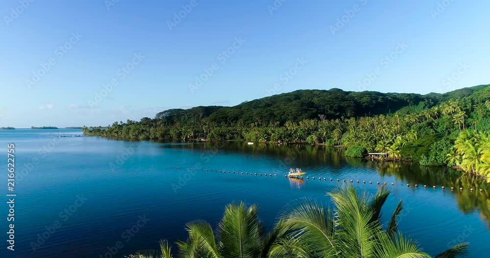 fishing boat in a tropical landscape, French Polynesia fishing boat in a tropical landscape, French Polynesia