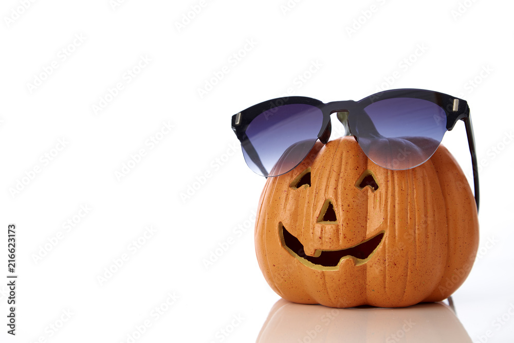 Fototapeta premium pumpkin jack lantern with sunglasses