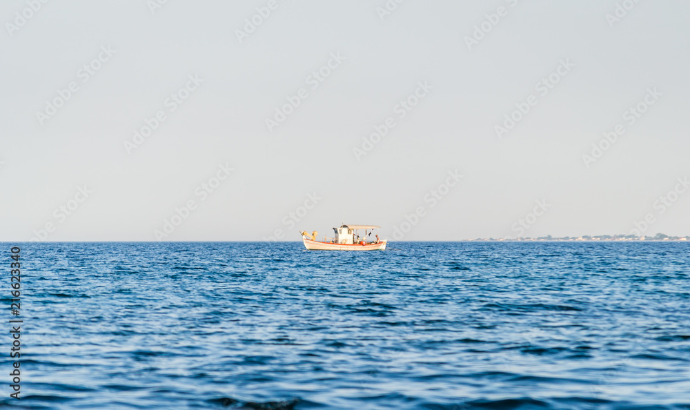 Fishing boat on the high seas in Leptokaria Greece Fishing boat on the high seas in Leptokaria Greece
