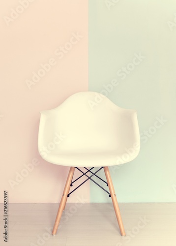 White chair on pastel background photo