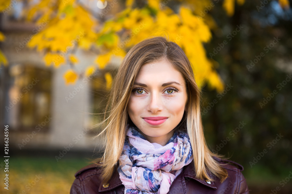 Happy teen girl smile during walking on autumn park Happy teen girl smile during walking on autumn park