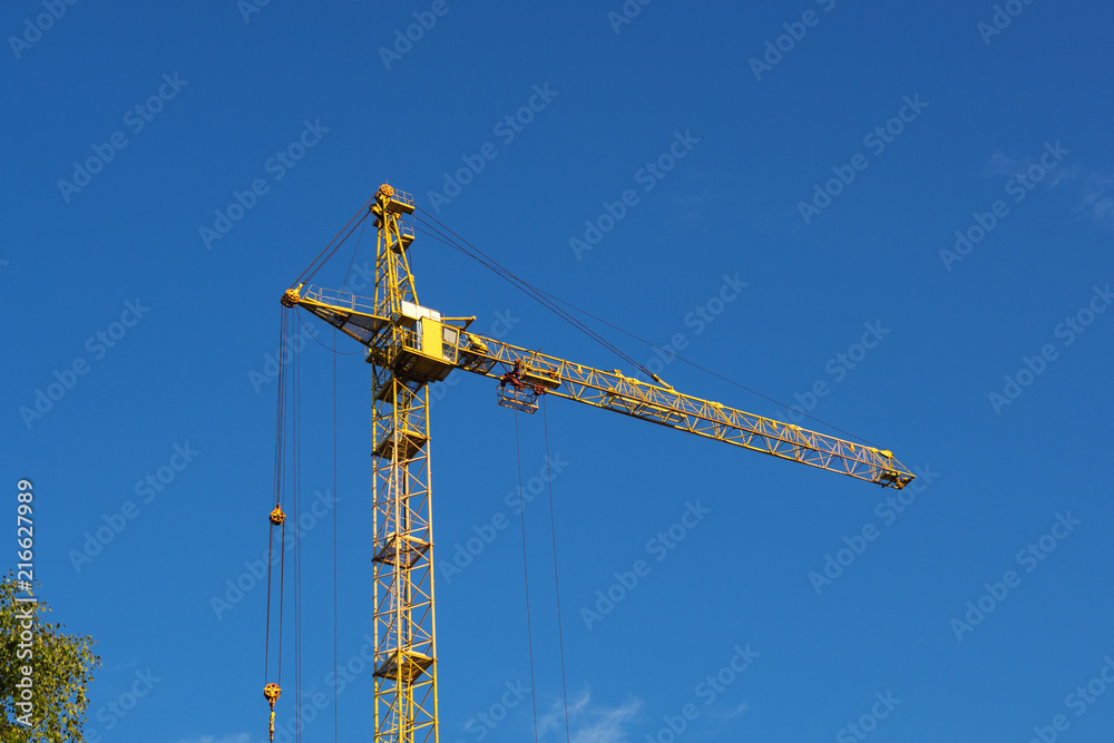 construction crane on blue sky background construction crane on blue sky background