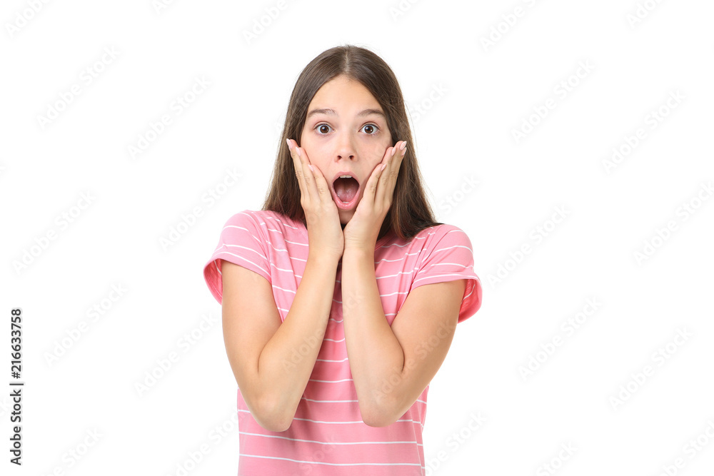 Surprised young girl on white background Surprised young girl on white background