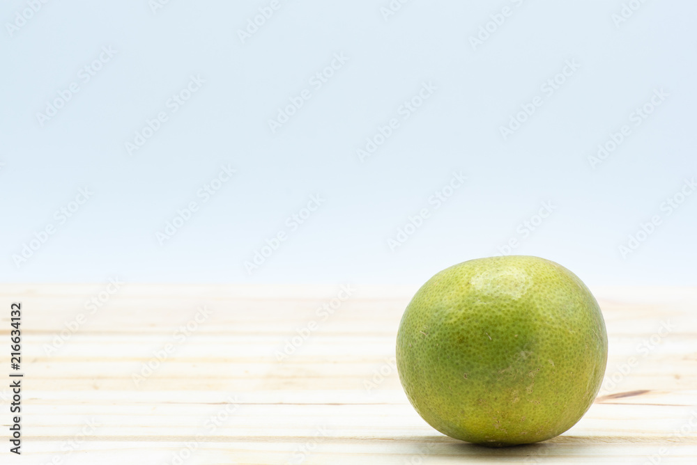 Lime on wood table Lime on wood table